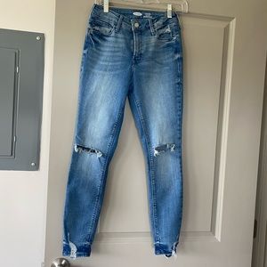 Blue jeans with holes on knee